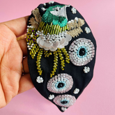 Beaded black bird evil eye headband
